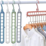 cintres pliables rotatifs et antidérapants, multifonctionnels et peu encombrants, avec 9 trous pour penderie ou dressing.